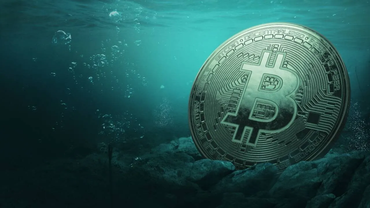 Bitcoin underwater. Image: Shutterstock